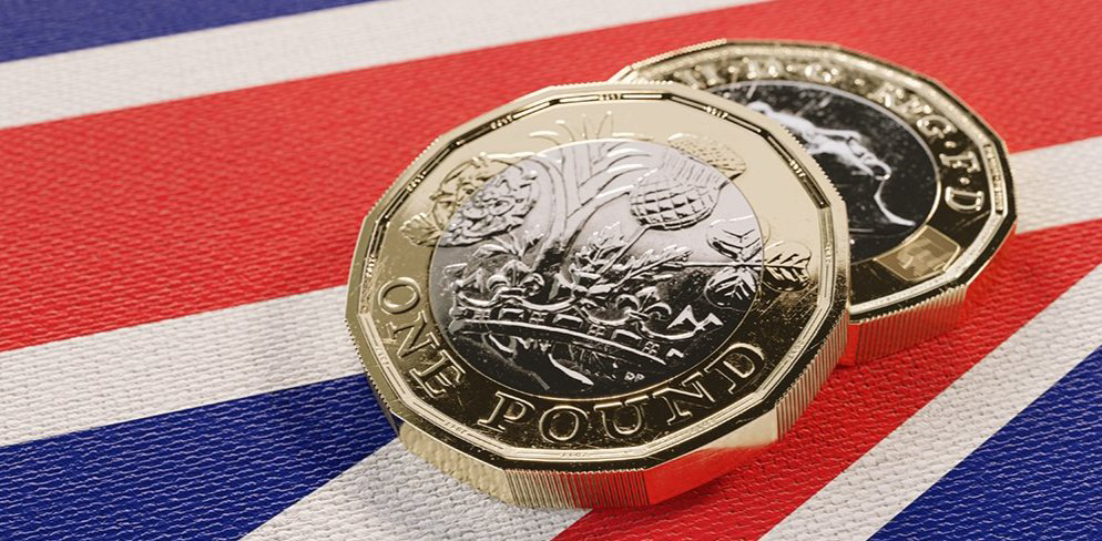 pound coins on union jack