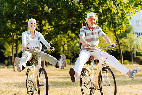 Older couple enjoying bike ride